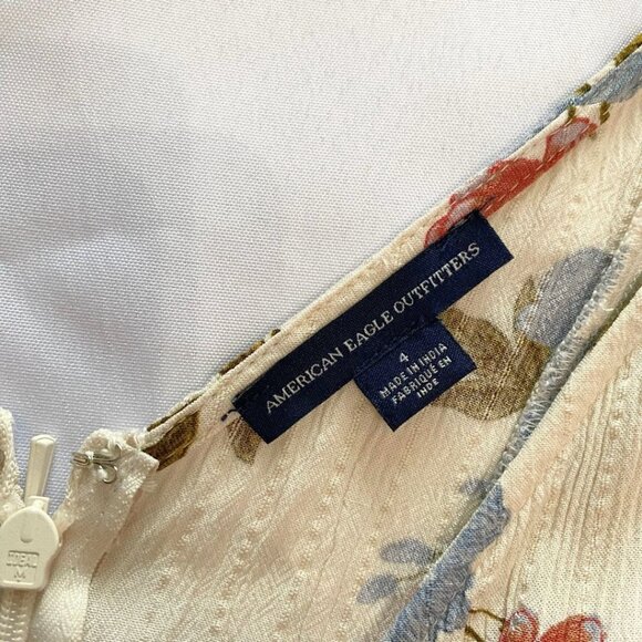 AMERICAN EAGLE AEO WHITE BLUE FLORAL SURPLICE BELTED WIDE FULL SLIT LEG JUMPSUIT - Picture 7 of 11